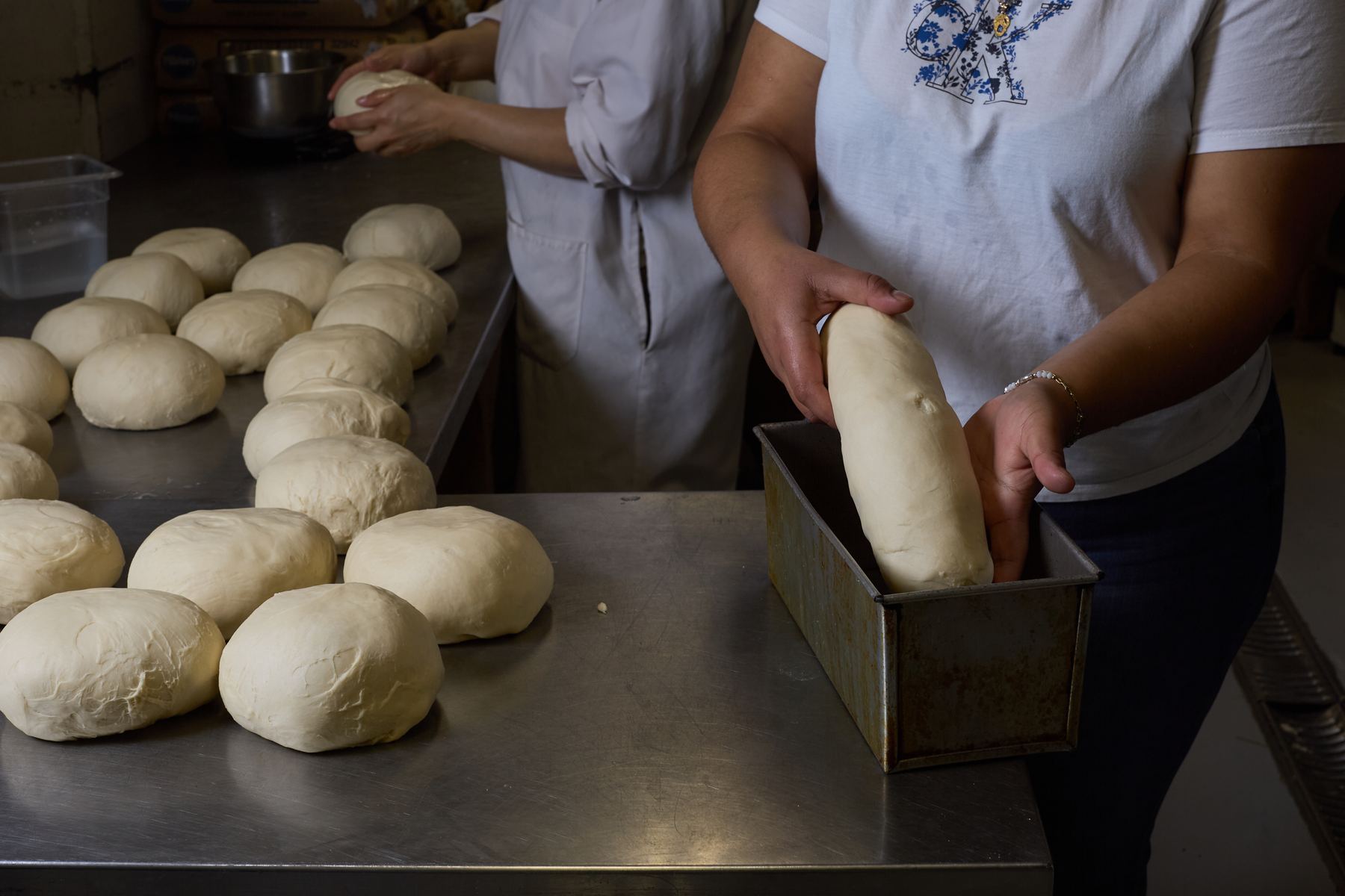 Shaping dough into a loaf pan